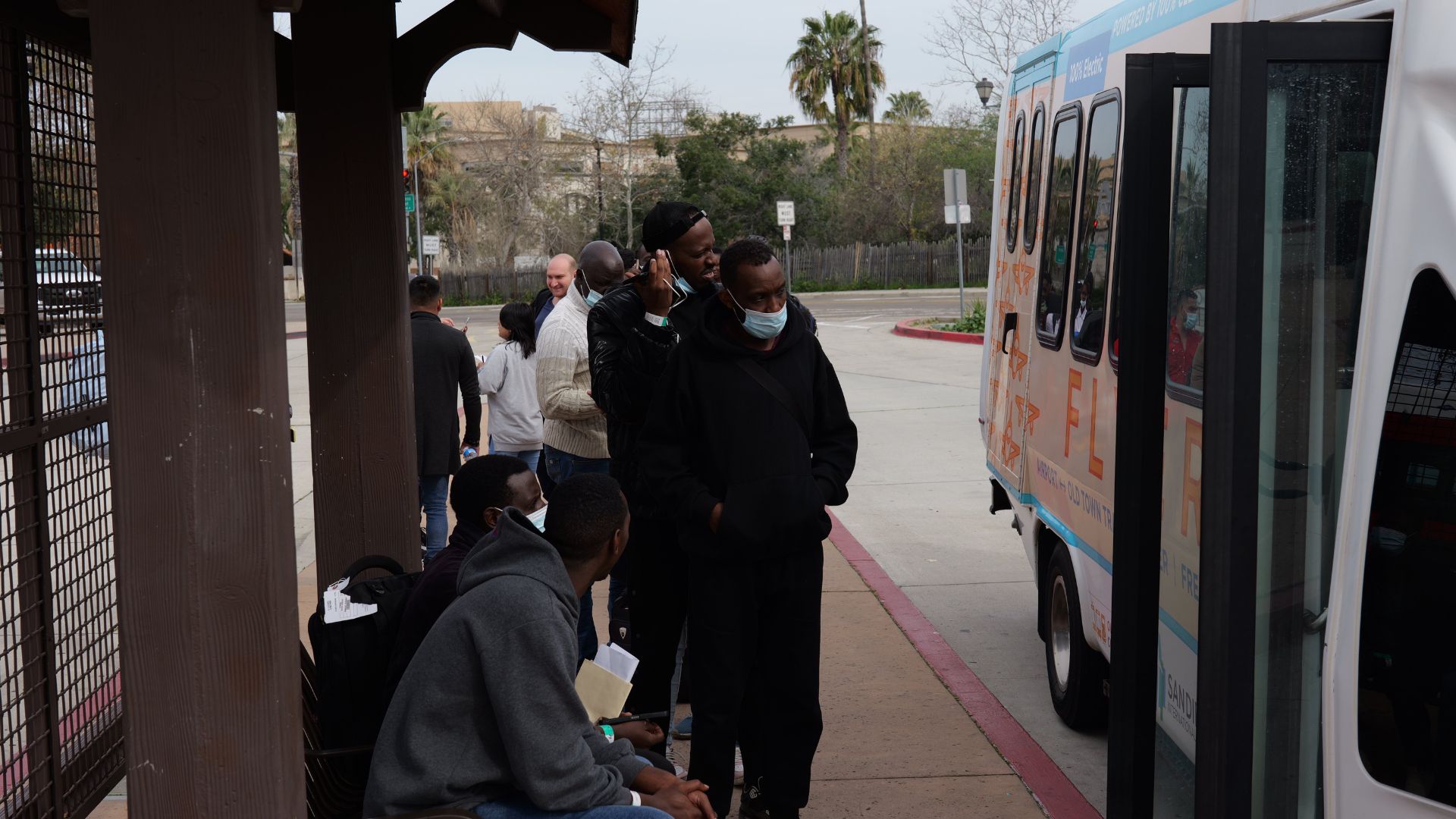 The customers waiting in line to buy guns expressed their concerns about the increasing number of migrants being released in the area