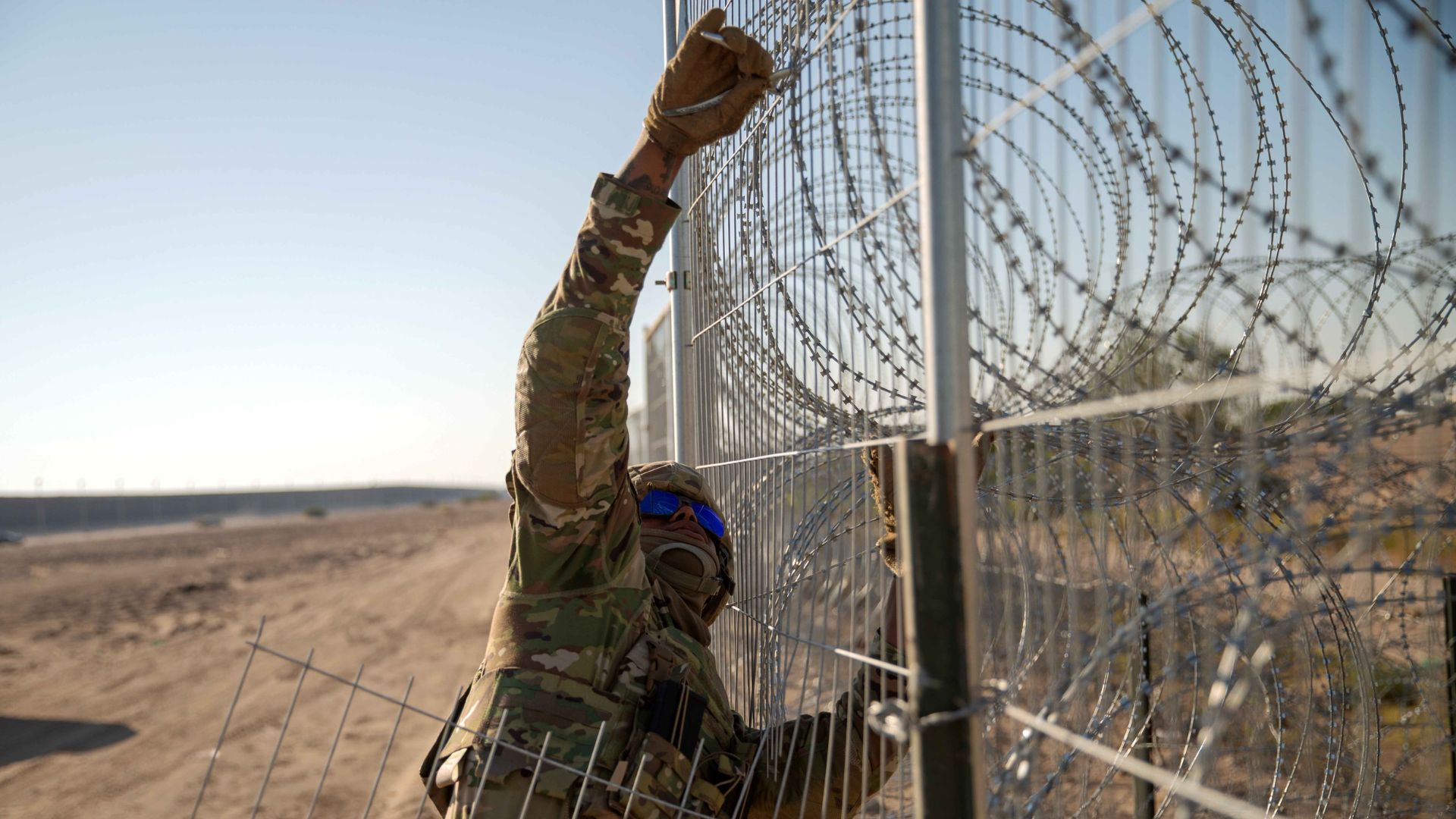 Texas National Guard soldiers are equipped with non-lethal pepperball ammunition to combat illegal immigrants who use trains to get into Texas