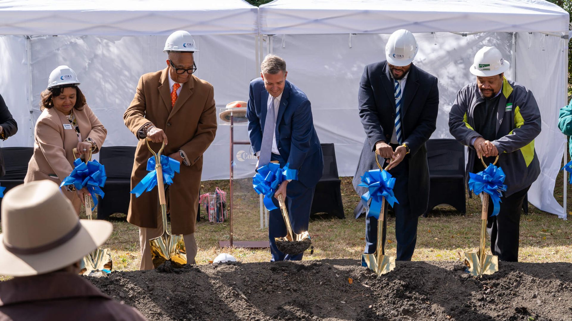 Officials gathered in the Jones McDonald Community Club Neighborhood to celebrate a groundbreaking event that promises new housing opportunities and community growth