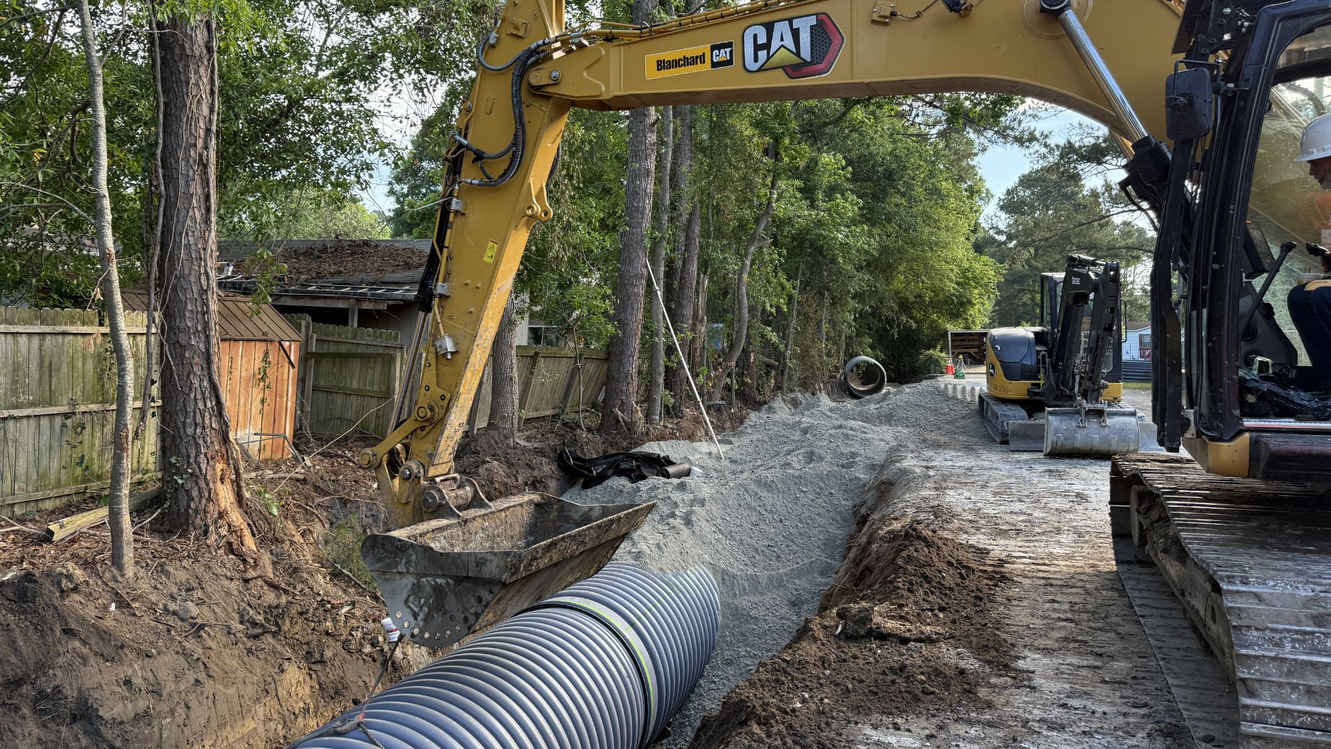 Now she passes new roofs, new turn lanes, new subdivision signs, new storage buildings, new clearing work and new traffic that seems to arrive before the roads do.